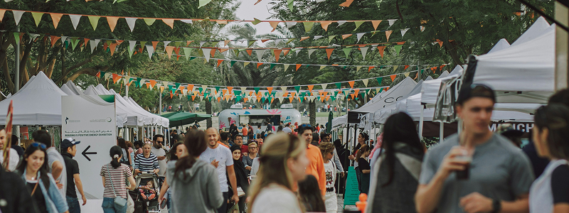 Crowd at outdoor festival entrance